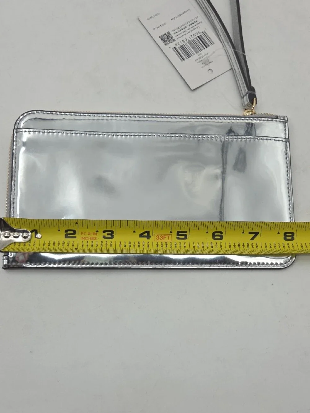 kate spade Metallic Silver Zip Wristlet